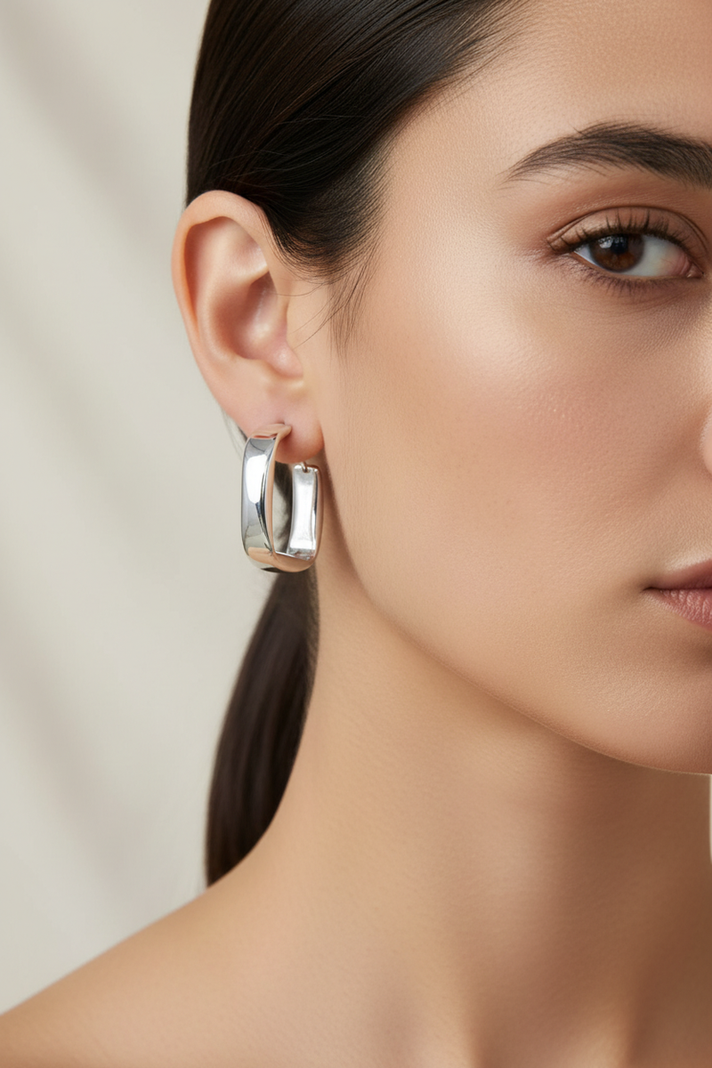 Close-up model wearing the earrings