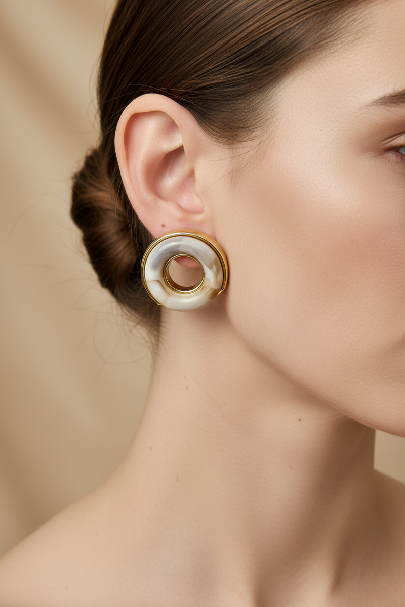 Close-up of the earrings on a model