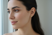 Evil Eye Stud Earrings on woman