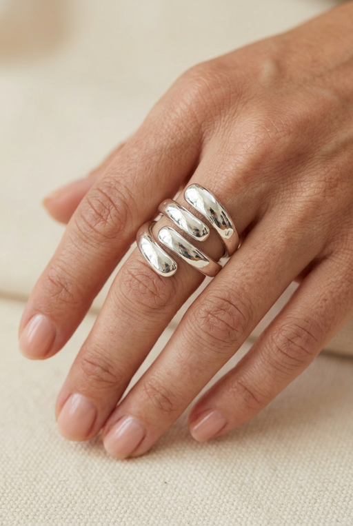 Model’s hand wearing the layered silver ring