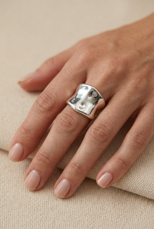 Model’s hand wearing the silver ring