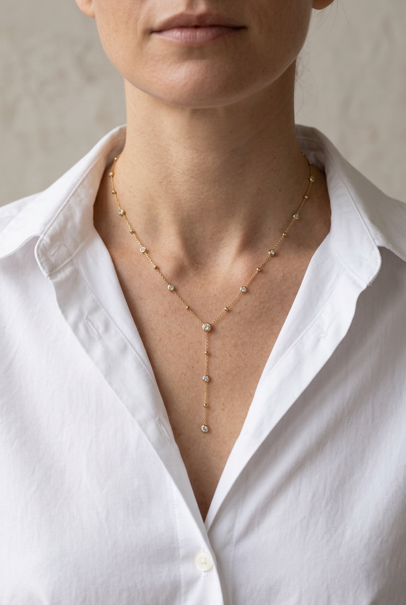 Necklace styled on a model wearing a white shirt
