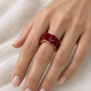 Ring worn around the model’s middle finger