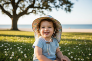 Toddler in Fish Print Sun Hat Outdoors